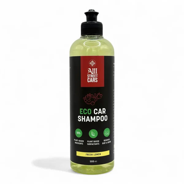 A bottle of ECO Car Shampoo with a label that includes the brand name and the scent, fresh lemon.