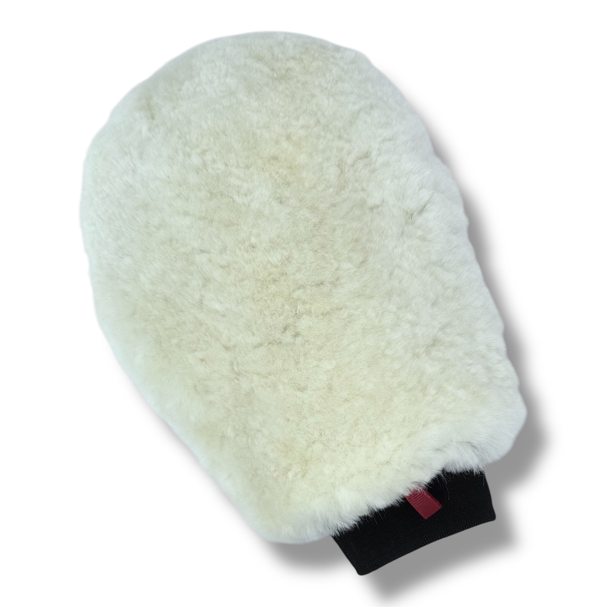 White fluffy mitt on a white background