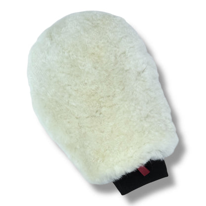 White fluffy mitt on a white background